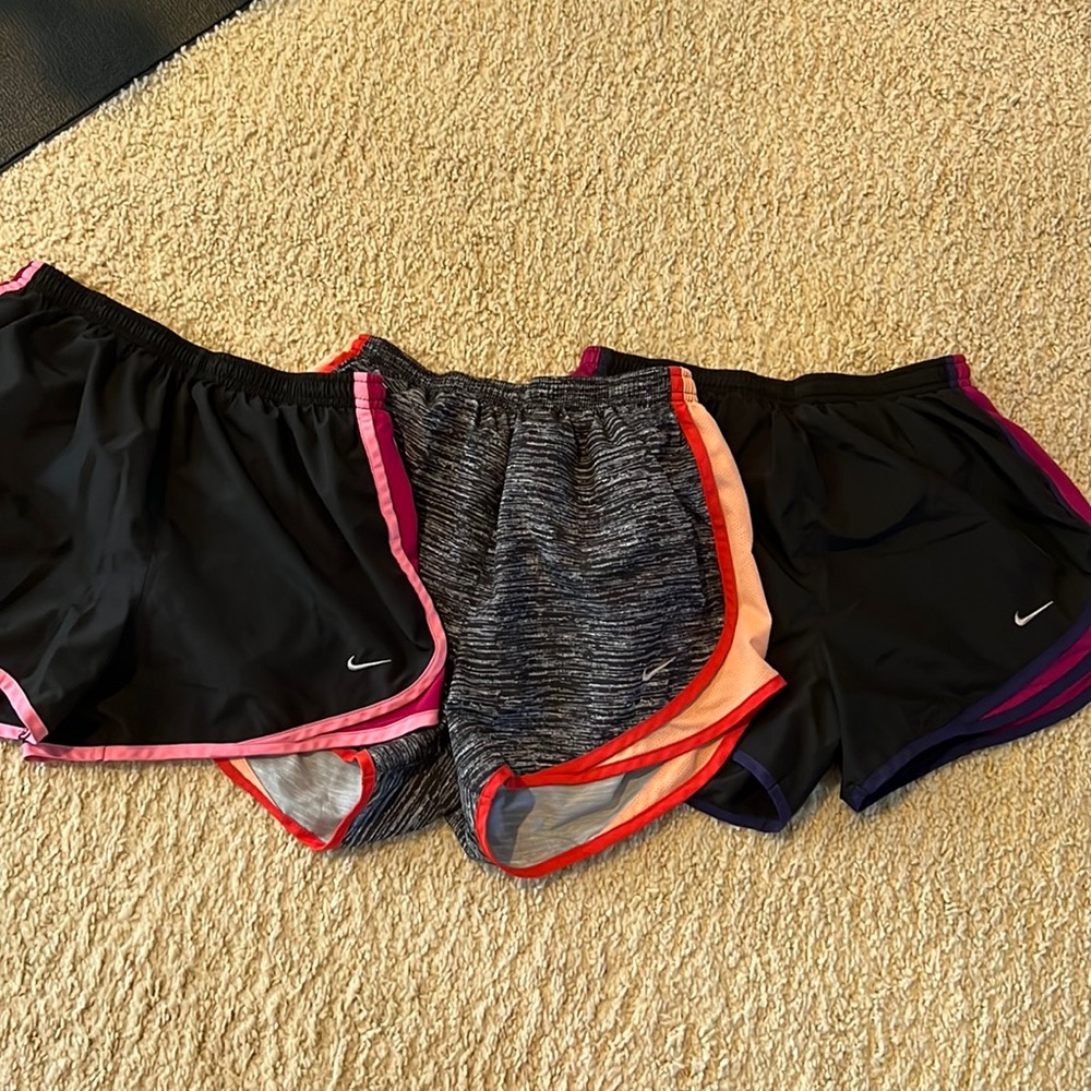Nike Dri-Fit running shorts. 3 pairs. All size small. Various colors.
